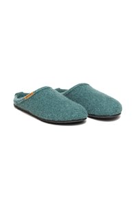 Wool slippers in a teal color with a soft texture, open back, and black rubber sole. Features a small brand tag on the side.