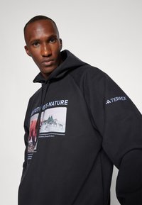 Adidas Terrex NATIONAL GEOGRAPHIC AERO.READY_WARMING HOODY - Felpa con cappuccio - black