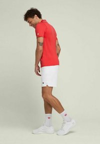 Wilson PLAYERS TEAM - Polo - infrared