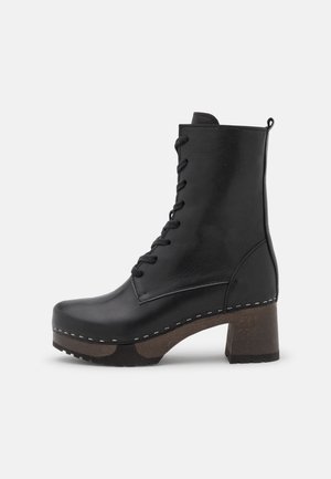 Botines con plataforma - black