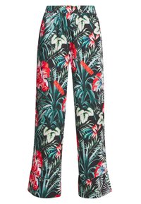 Wijde broek met bloemenpatroon, met felrode en groene tropische designs op een zwarte achtergrond, voorzien van een elastische tailleband en witte labels.