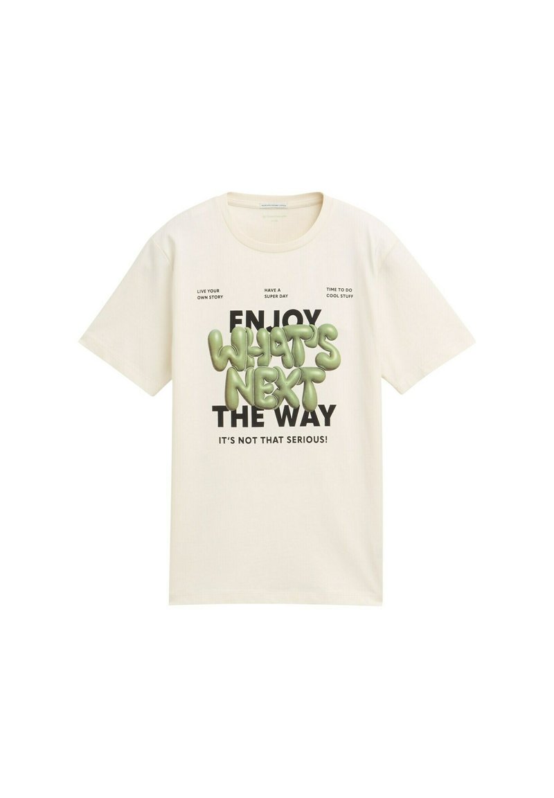Krämfärgad bomull t-shirt med korta ärmar, prydd med lekfull grön bubbeltextdesign och fet svart text. Texten innehåller olika fraser.