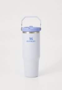 Tall, light purple Stanley travel mug with a handle on the lid and a flip-top drinking spout on a white background.