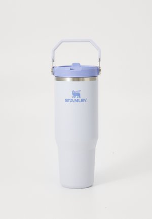 Tall, light purple Stanley travel mug with a handle on the lid and a flip-top drinking spout on a white background.