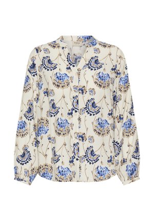 Bijela bluza s uzorkom plavog i bež cvijeća, dugim rukavima, ovratnikom i kopčanjem na gumbe sprijeda. Lagani materijal sa teksturiranim završetkom.