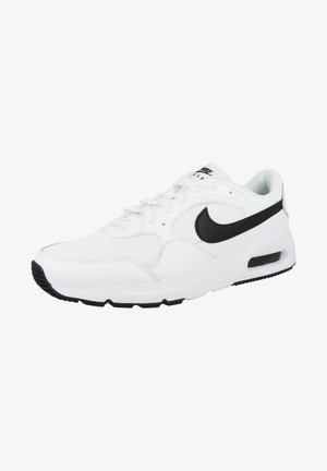 White athletic shoe with black Nike swoosh, mesh and leather upper, round toe, lace-up front, padded collar, and rubber sole with visible air unit.