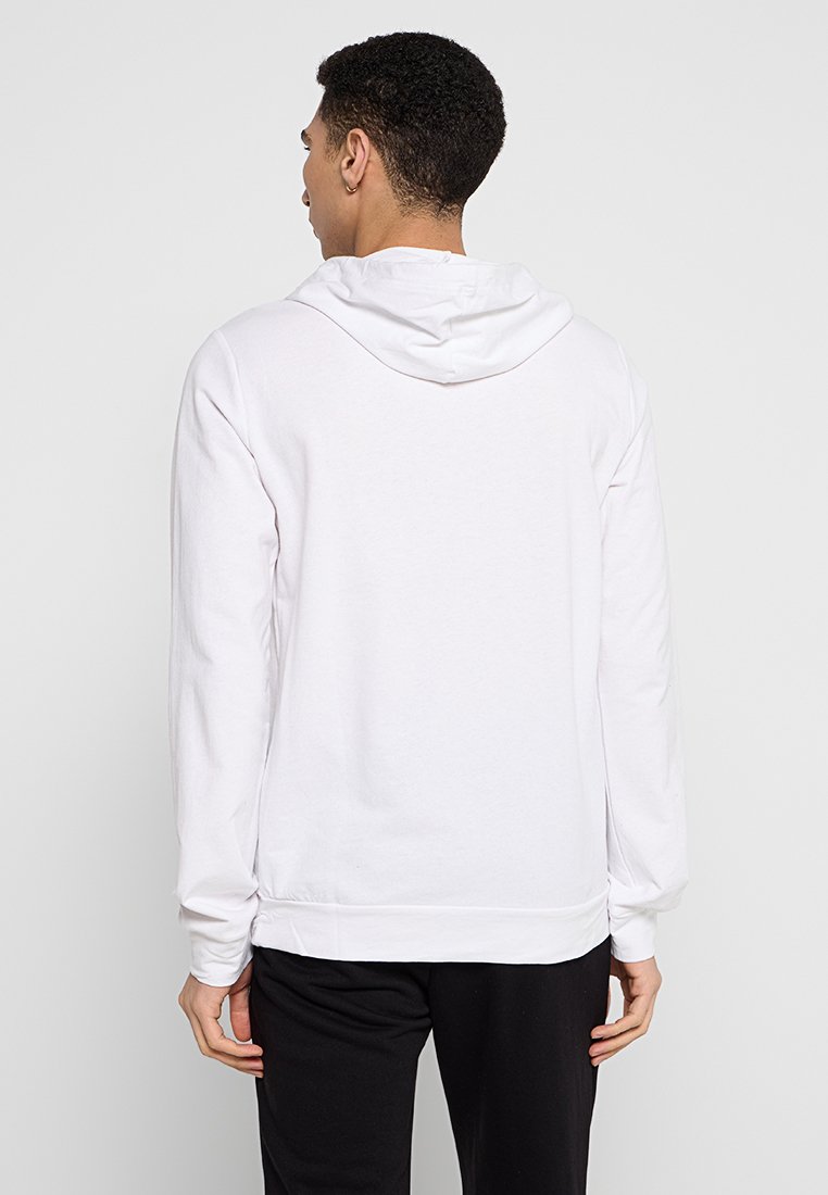 Witte hoodie met een trekkoordcapuchon, lange mouwen en een kangoeroezak. Gemaakt van zachte stof met een relaxte pasvorm, kenmerkt zich door ribgebreide manchetten en een ribgebreide zoom.