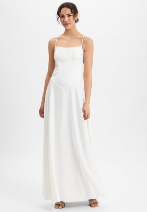 White maxi dress with thin spaghetti straps, a square neckline, and a flowing silhouette, featuring smooth texture and delicate seams.