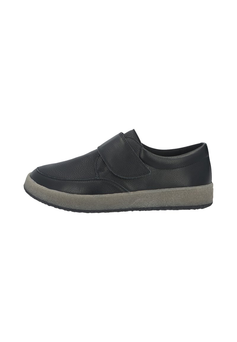 Black leather shoe with a Velcro strap, low profile, rounded toe, textured upper, and a light gray rubber sole.