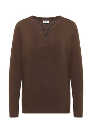 Hnědý dlouhý rukáv top z měkké tkaniny s výstřihem do V, který má tříknoflíkovou légu a uvolněný střih. Hladká textura, minimální akcenty.