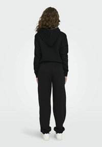ONLY JOGGING - Treningo apatinė dalis - black