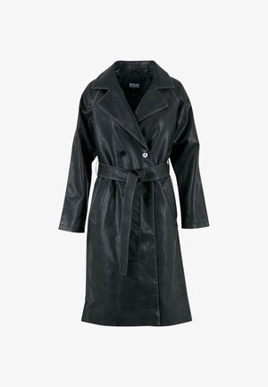Mustast kunstnahast valmistatud trench coat kahepoolse disainiga, sälguga kaelus, pikad varrukad, küljetaskud ja vöö, mis on seotud vöökohal.