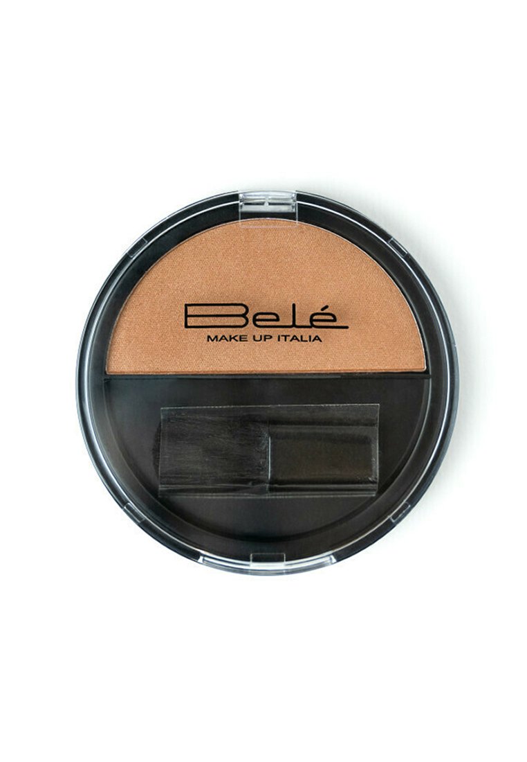 Cialda di bronzer arrotondata con una superficie bronzea lucida, un coperchio di plastica trasparente e un pennello incluso per l'applicazione.
