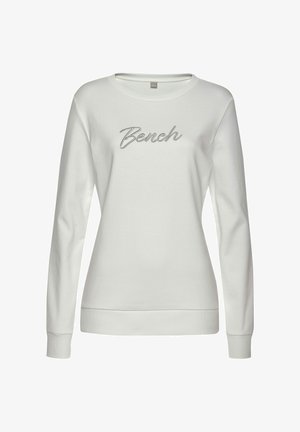 Weißes Sweatshirt mit langen Ärmeln und Rundhalsausschnitt. Mit dem Wort "Bench" in Silber gestickt. Weicher Stoff und gerippte Bündchen.