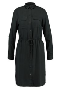 Tmavě zelené šaty z lehkého materiálu, s límečkem, předním zapínáním na knoflíky, dvěma náprsními kapsami a elastickým páskem v pase pro tvar.