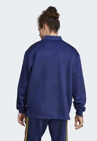 adidas Originals ADICOLOR CLASSICS+ - Polo - dark blue   crew yellow