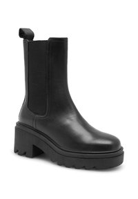 Botín de piel negra hasta el tobillo con paneles laterales elásticos, puntera redondeada y suela gruesa. Cuenta con una lengüeta para facilitar el uso. Textura horizontal en la suela.