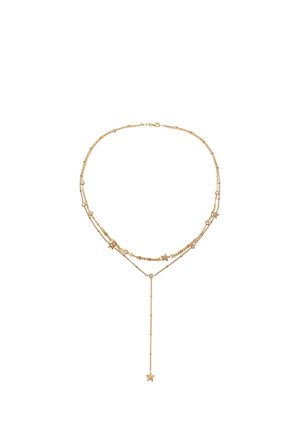 Delikat lagdelt halskæde i guld med flere stjerneformede vedhæng og små indlejrede krystaller, med en lang kæde, der ender i et stjernevedhæng.