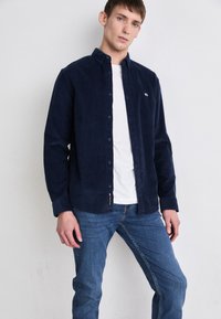 Tommy Hilfiger CORE BLEECKER  - Jeans Slim Fit - mid blue