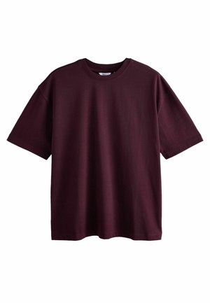 Bordeauxfarbene Baumwoll-T-Shirt mit kurzen Ärmeln, Rundhalsausschnitt und lockerer Passform. Glatte Oberfläche und einfarbig ohne sichtbare Muster oder Akzente.