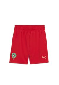 Röda sportshorts i lättviktig tyg. Har en gyllene Puma-logotyp och en broderad marockansk symbol på vänster ben. Elastisk midja med fickor.