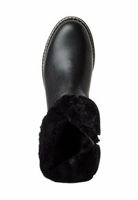 Bottine en cuir noir avec une doublure en fourrure noire douce, bout arrondi et un accent blanc cousu autour de la semelle. Fermeture éclair sur le côté.