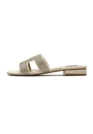 Beige open-toe slide sandal with two wide fabric straps and a low block heel, shown from the side on a white background.