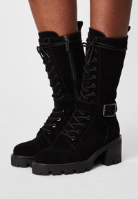 Tamaris Stivaletti con plateau - black
