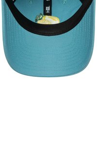 Light blue baseball cap brim with black inner lining and an embroidered lemon and lime design near the center.