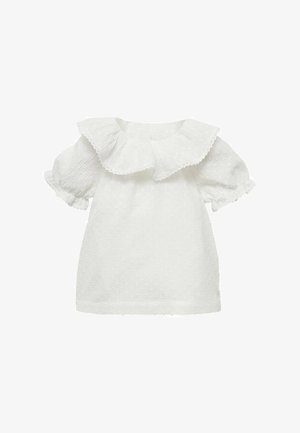 Bílá blůza s krátkým rukávem a volánkovým límcem, vyrobená z texturované látky se vzorem malých teček. Měkký a lehký design.