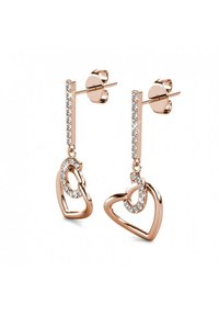 Orecchini in oro rosa con pendenti a forma di cuore. Presentano un fermo verticale decorato con piccole pietre cristalline trasparenti. Superficie liscia e lucida.