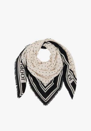 Kremowy szalik w czarne kropki, z czarno-białym paskowanym brzegiem i frędzlami na krawędziach, złożony w trójkątny kształt.