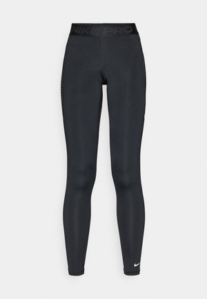 Leggings negros Nike Pro con una cinturilla alta, que cuentan con un panel lateral texturizado y un pequeño logo blanco en la parte inferior de la pierna. Acabado de tela lisa.