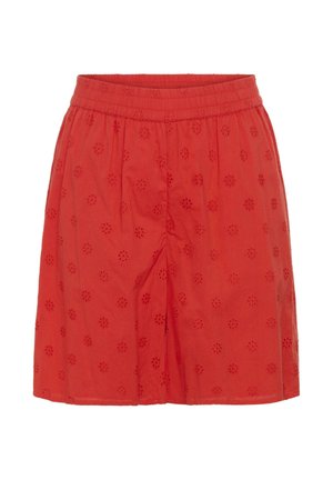 Red knee-length skirt with an elastic waistband and embroidered floral eyelet pattern throughout the fabric.
