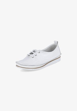 White lace-up shoe with a rounded toe, smooth synthetic upper, contrasting stitching, and a flat sole with a textured tread.