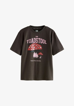 Dark brown cotton t-shirt featuring a graphic of a red toadstool with white spots and text "THE TOADSTOOL" above in pink. Short sleeves.