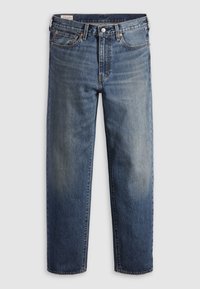Jean denim bleu à jambes droites avec légère décoloration sur les cuisses et les genoux, doté d'un bouton à l'avant et d'un design à cinq poches.