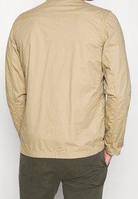 Schott Lehká bunda - sand