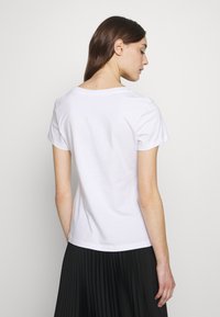 Calvin Klein Jeans MONOLOGO SLIM TEE 2 PACK - T-shirt básica - bright white