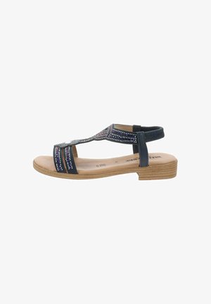 Sandal blu con decorazioni, suola piatta e cinturino posteriore. La parte superiore ha una finitura texturizzata con strisce a contrasto.