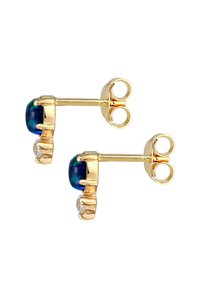 Guldörrhängen med en blå-grön ädelsten och en klar rhinestone-accent, med en säker fjärilsbackning och slät yta.