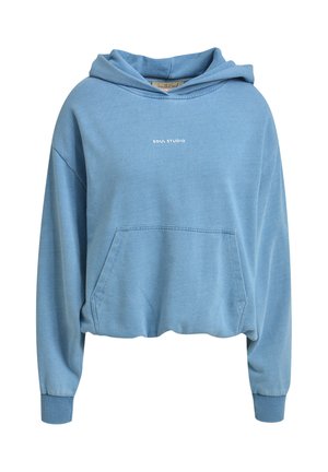 Light blue cropped hoodie with front kangaroo pocket and "SOUL STUDIO" text printed in white on the chest.