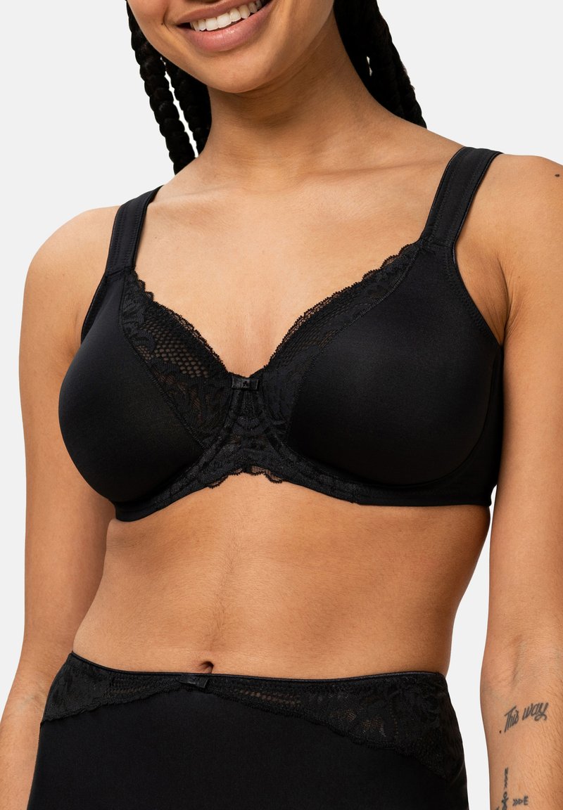 Reggiseno nero con pizzo, realizzato in tessuto morbido ed elasticizzato, con una finitura liscia e spalline regolabili. Le coppe presentano una delicata sovrapposizione di pizzo.