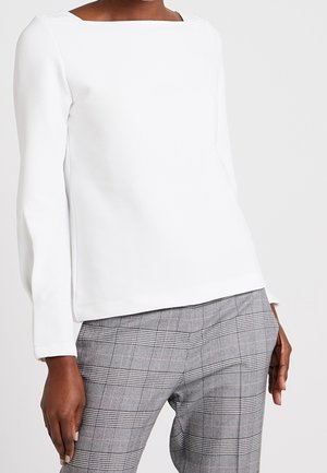 Långärmad tröja - white