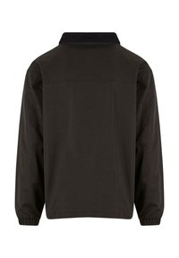 Black outerwear jacket with a collar, long sleeves, and elastic cuffs. Features a smooth texture and simple design without visible hardware.