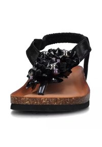 Infradito neri con suola in sughero testurizzato, dotati di un cluster di perle decorative nere e metalliche sulla cinghia.