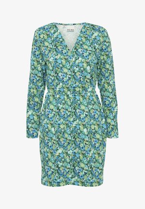 Robe fleurie avec un décolleté en V, des manches longues et une taille cintrée. Présente un fond vert avec des motifs floraux bleus et jaunes.