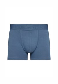 Boxers azules hechos de tela suave. Presentan una cinturilla texturizada con el nombre de la marca en relieve. Diseñados para la comodidad y el ajuste.