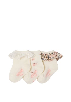 Three pairs of cream baby socks with ruffled lace and floral fabric cuffs, arranged side by side on a white background.
