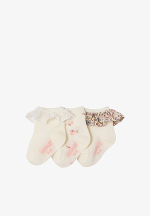 Three pairs of cream baby socks with ruffled lace and floral fabric cuffs, arranged side by side on a white background.